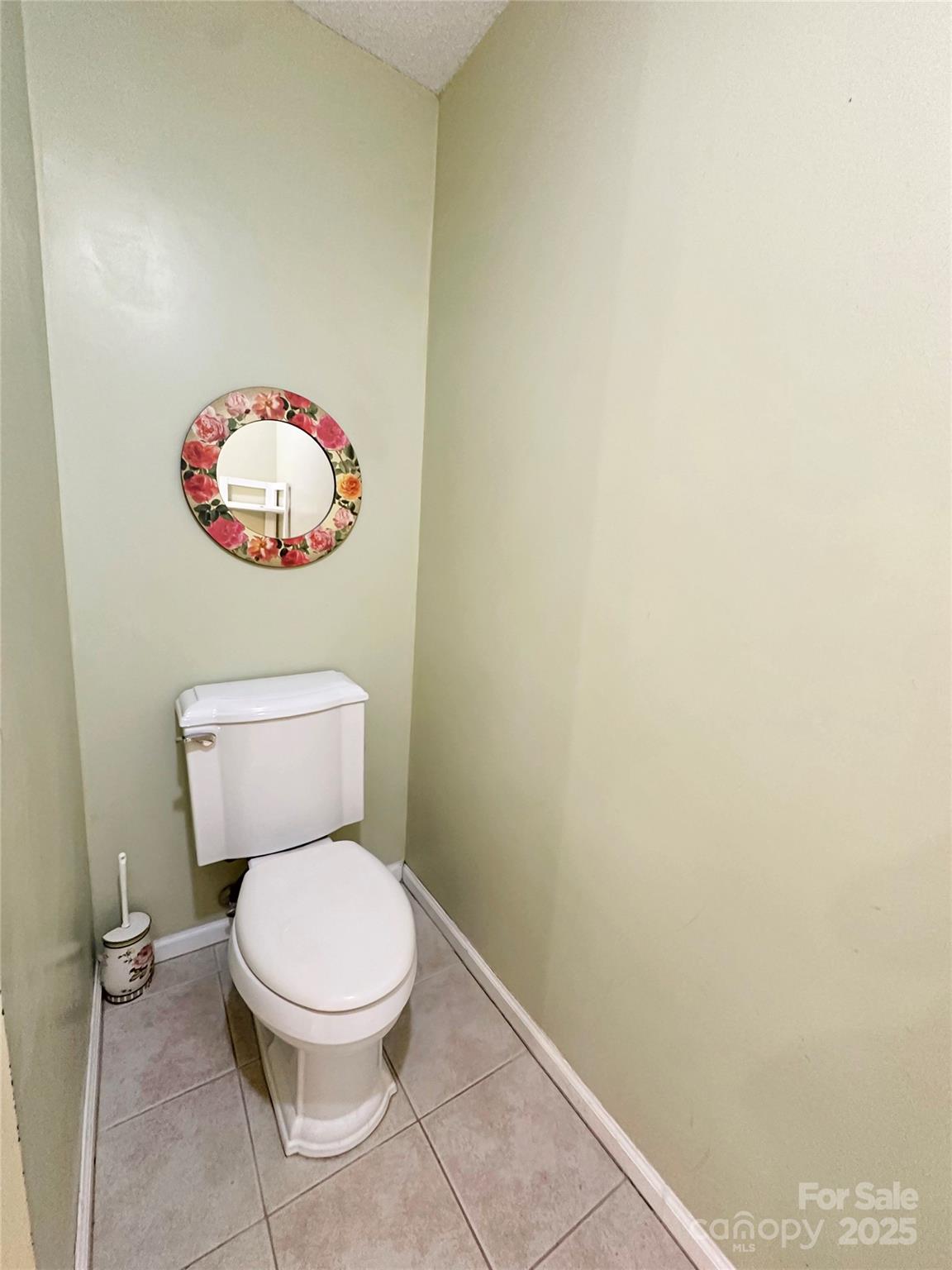 3245 15th Street Northeast Hickory, NC 28601 - Photo 22 of 39 a white toilet sitting next to a white wall