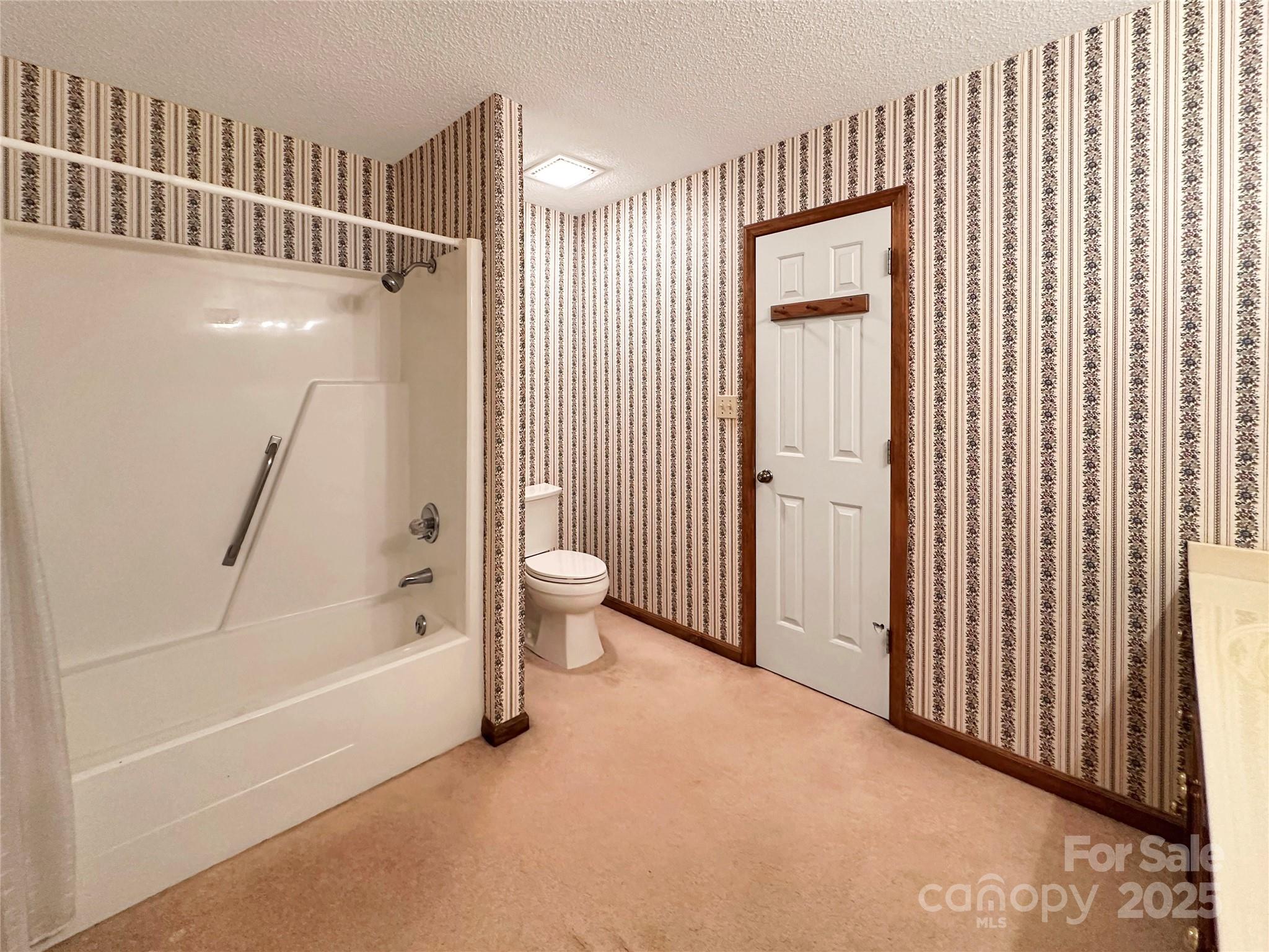 3245 15th Street Northeast Hickory, NC 28601 - Photo 29 of 39 a view of a bathroom with a tub and shower