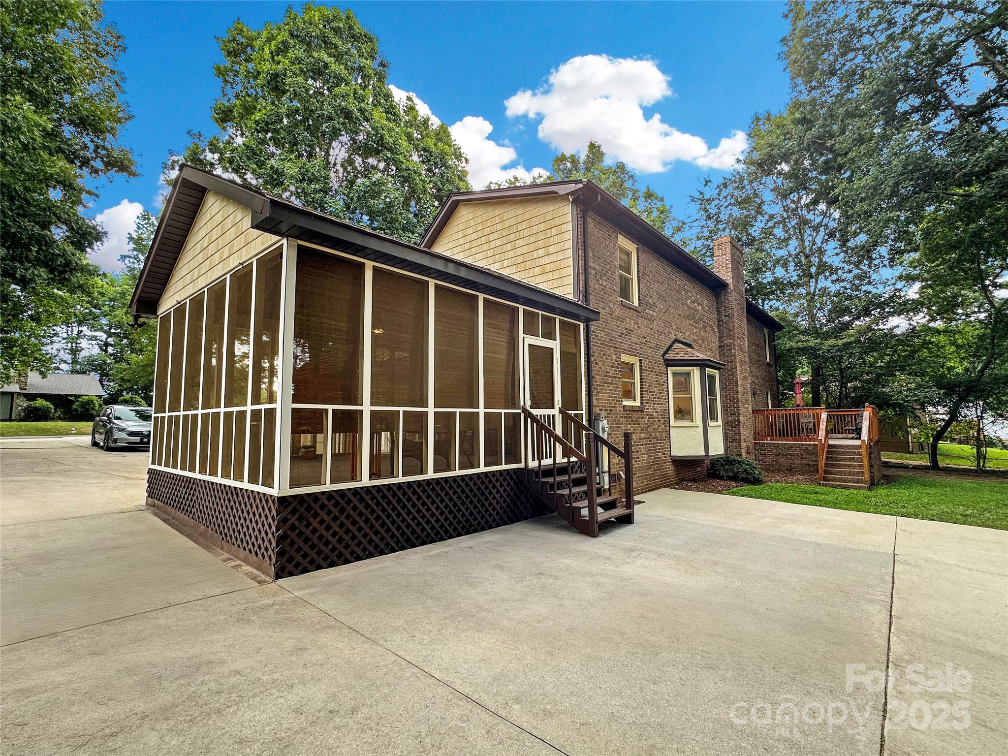 3245 15th Street Northeast Hickory, NC 28601 - Photo 36 of 39 a view of a house with backyard and sitting area