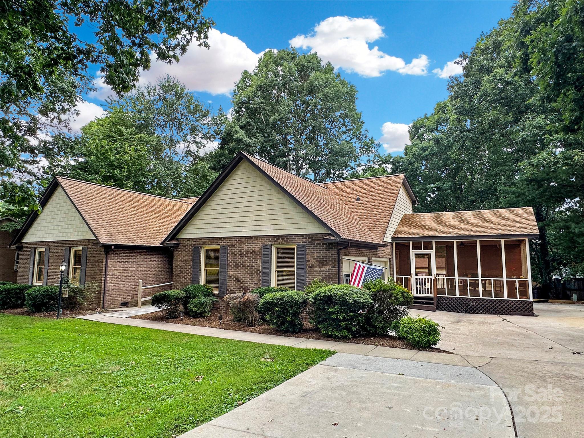3245 15th Street Northeast Hickory, NC 28601 - Photo 39 of 39 a front view of a house with a yard