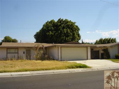 82141 Adobe Road Indio, CA 92201 - Photo 1 of 2 a view of swimming pool with a yard