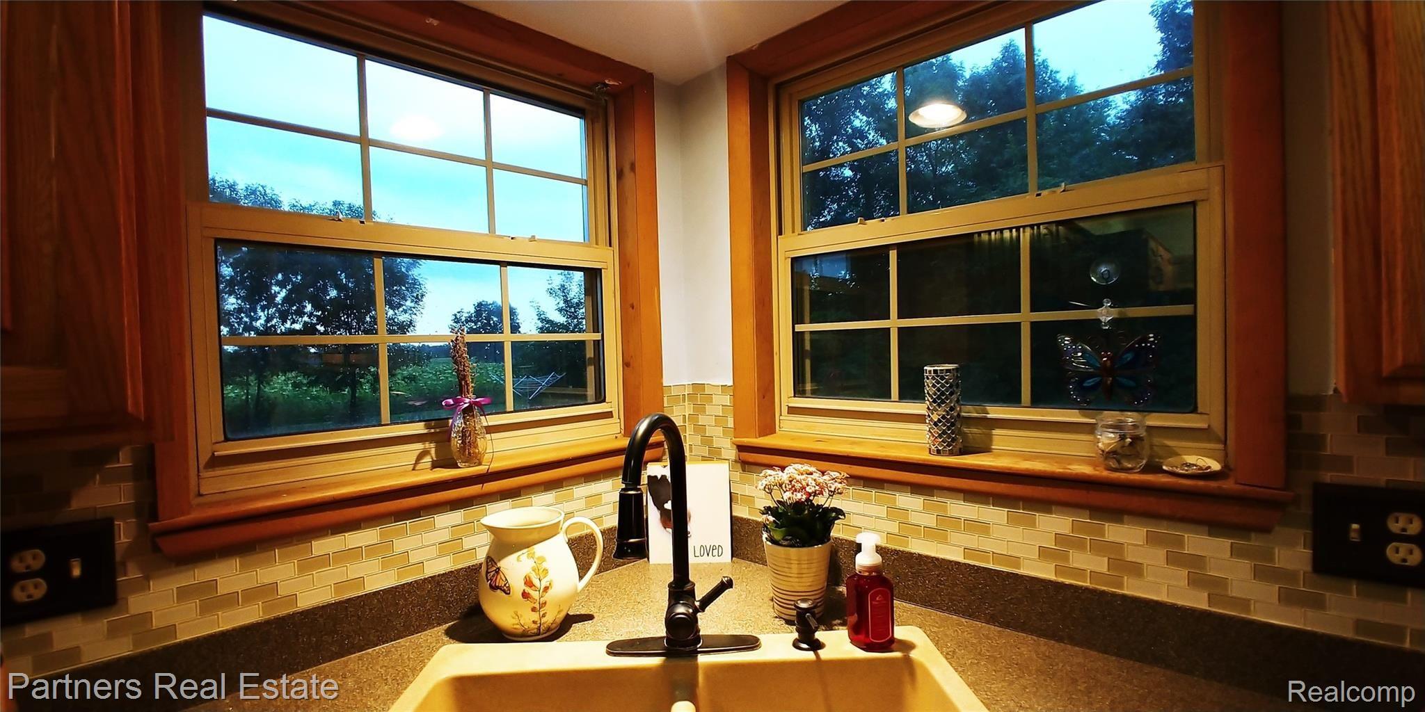 7451 Sanford Road Howell, MI 48855 - Photo 18 of 30 Delightful country views from each window of this home. You will feel at home the moment you walk in.