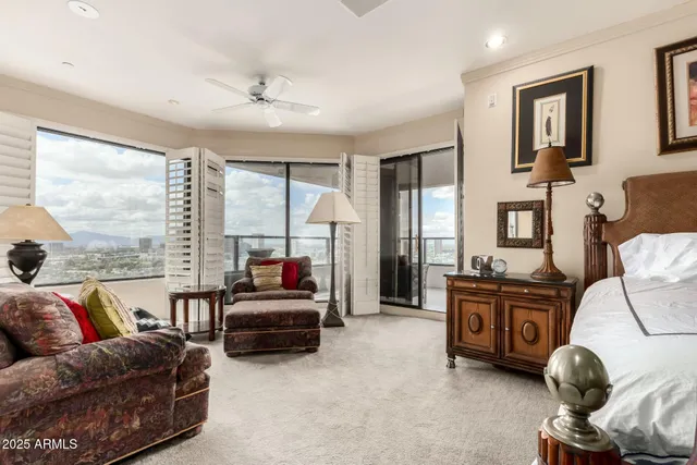 a spacious bedroom with a bed and furniture