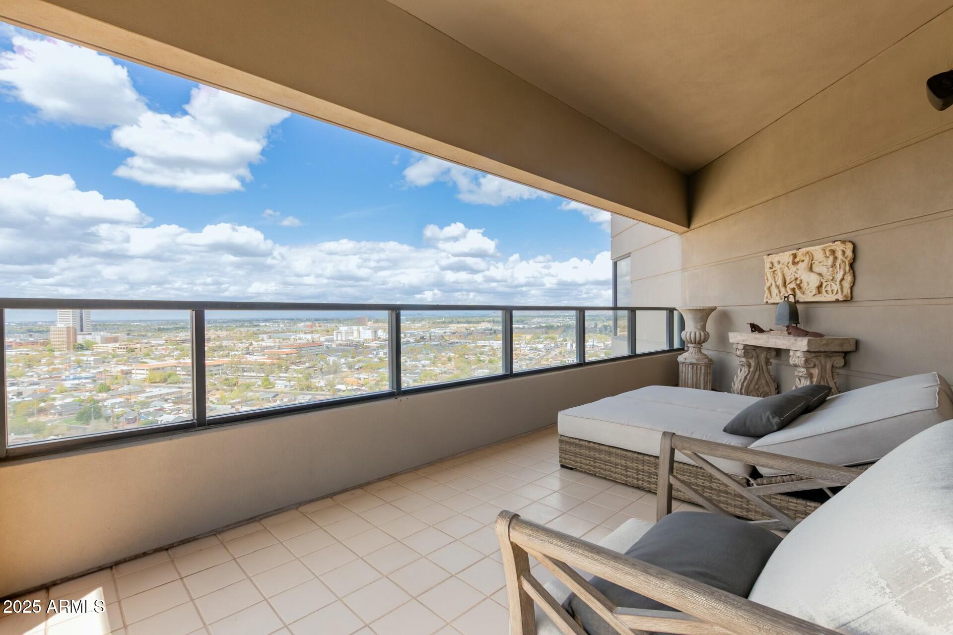 1040 East Osborn Road, Unit 1803 Phoenix, AZ 85014 - Photo 36 of 44 a living room with furniture