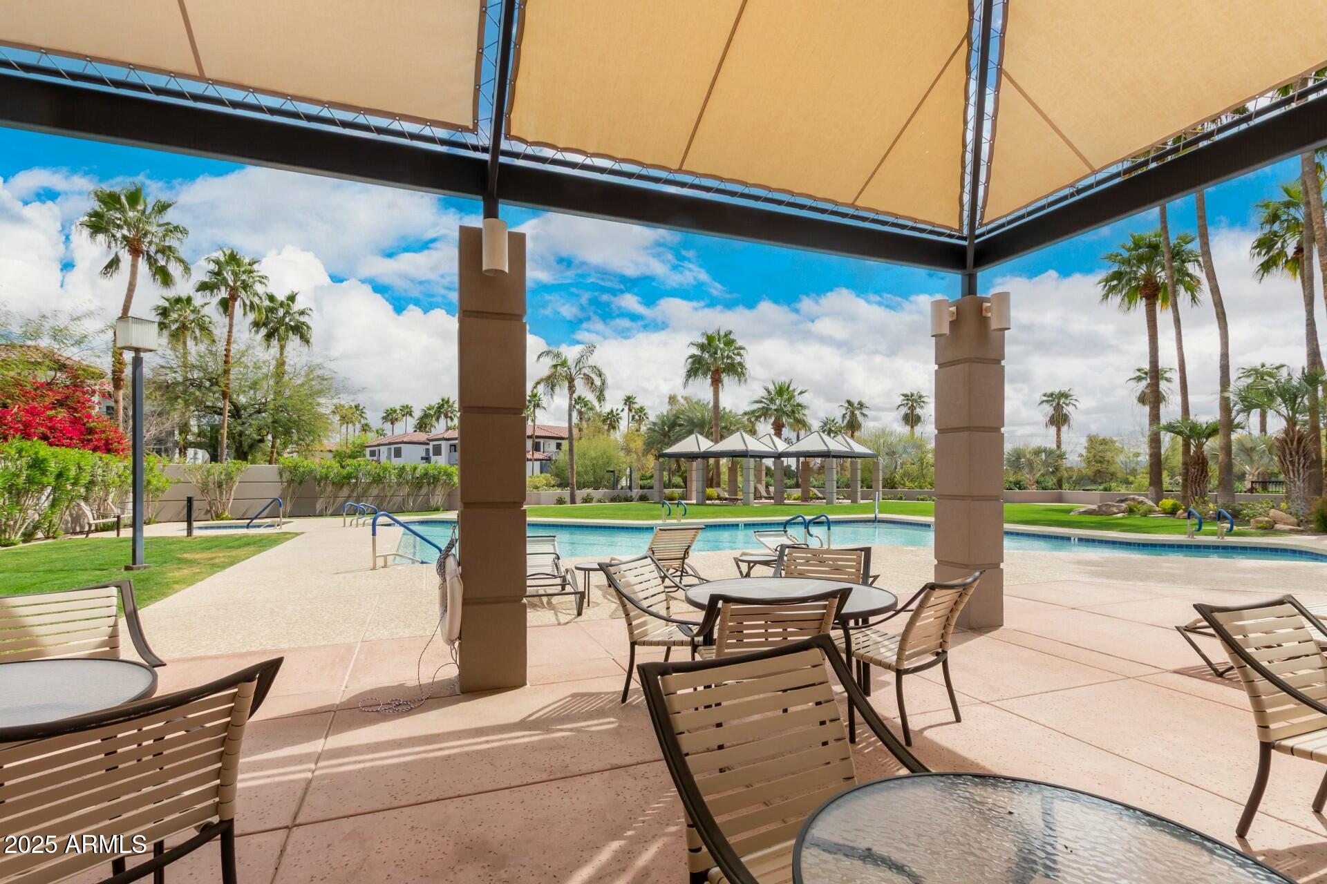 1040 East Osborn Road, Unit 1803 Phoenix, AZ 85014 - Photo 40 of 44 a outdoor view with a sitting space