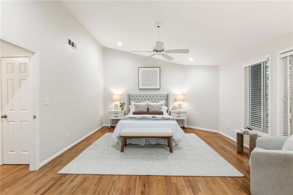 4010 Roswell Road Northeast, Unit 7 Atlanta, GA 30342 - Photo 25 of 36 a living room with furniture and a wooden floor