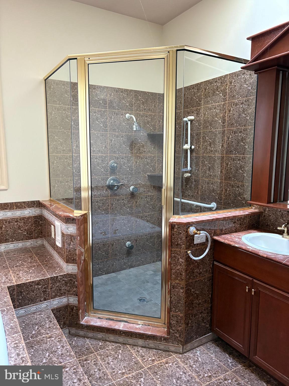 101 Robert Drive Wyomissing, PA 19610 - Photo 16 of 60 a bathroom with a sink and a mirror