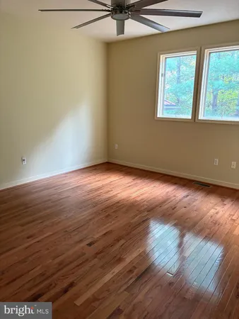 a bathroom with a toilet sink and shower