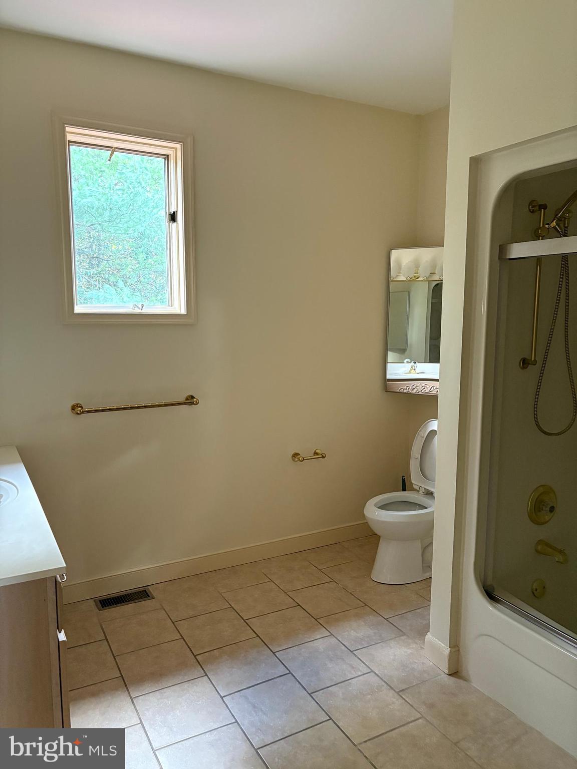 101 Robert Drive Wyomissing, PA 19610 - Photo 26 of 60 a bathroom with a toilet sink and shower
