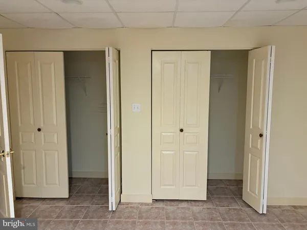 a kitchen with a stove and a refrigerator