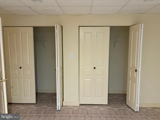 a kitchen with a stove and a refrigerator