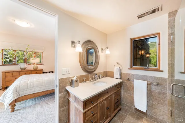 a living room with a couch and a window