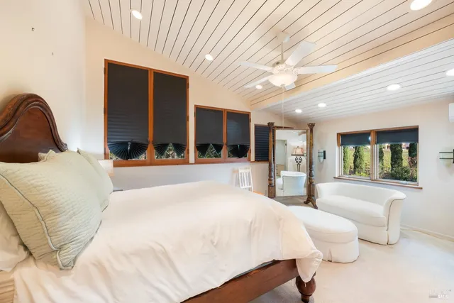 a view of a house with a mountain in the background