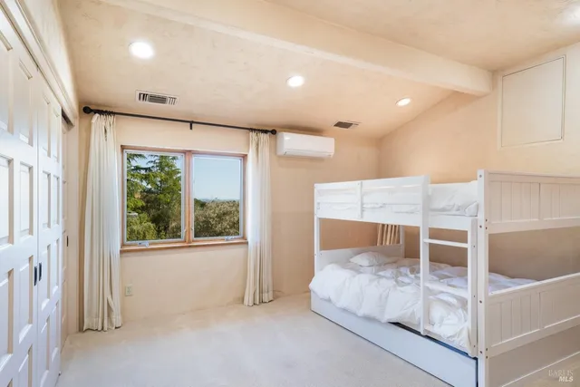 a view of a building with potted plants