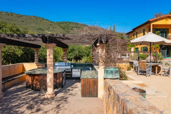 a view of a patio with swimming pool