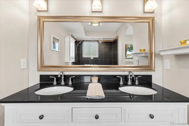 a view of a house with swimming pool and sitting area