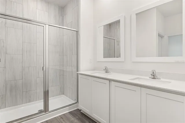 a bathroom with a sink and mirror