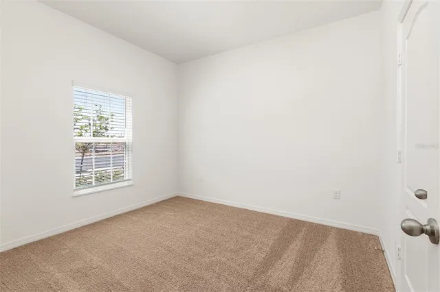 an empty room with a window