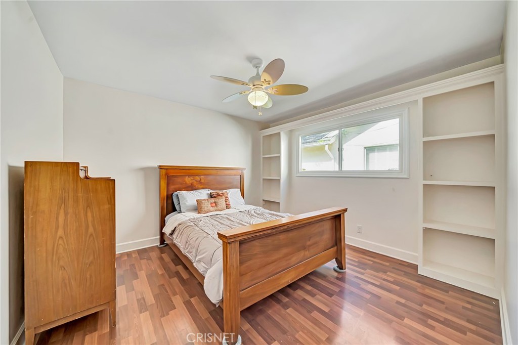 24201 St Edens Circle West Hills, CA 91307 - Photo 15 of 31 a bedroom with a bed and window