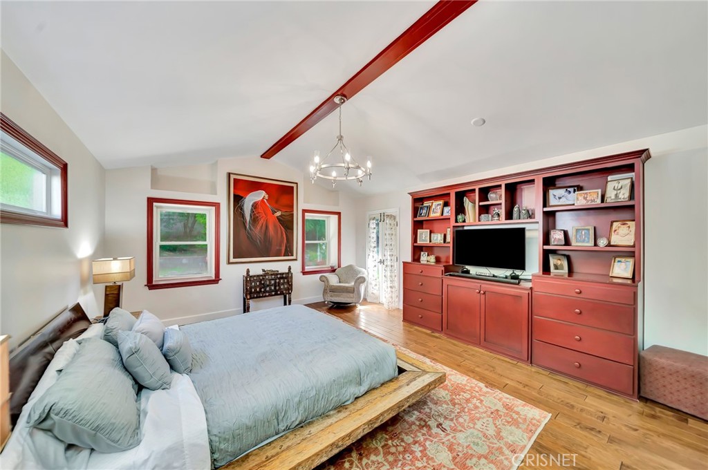 24201 St Edens Circle West Hills, CA 91307 - Photo 17 of 31 a living room with furniture and a flat screen tv