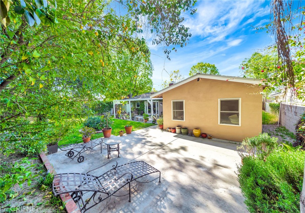 24201 St Edens Circle West Hills, CA 91307 - Photo 25 of 31 a view of a house with backyard and sitting area