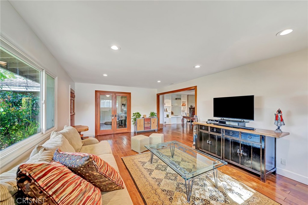24201 St Edens Circle West Hills, CA 91307 - Photo 4 of 31 a living room with furniture and a flat screen tv