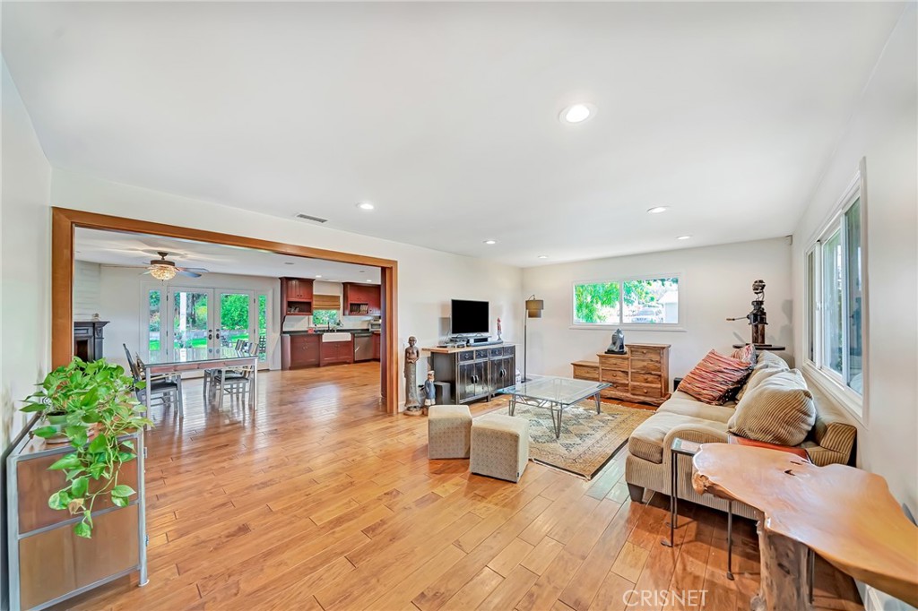 24201 St Edens Circle West Hills, CA 91307 - Photo 6 of 31 a living room with furniture and a wooden floor