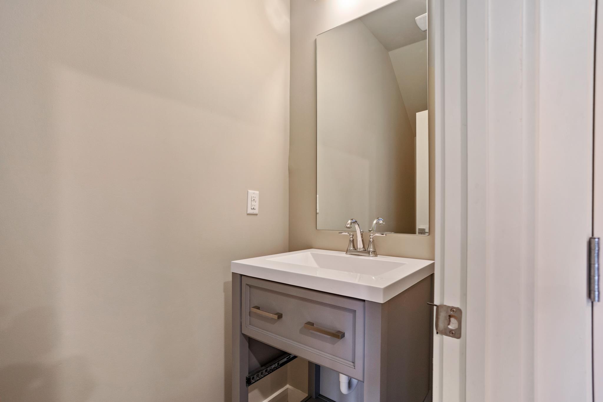 3635 Hydes Ferry Road Nashville, TN 37218 - Photo 8 of 18 A powder room downstairs.