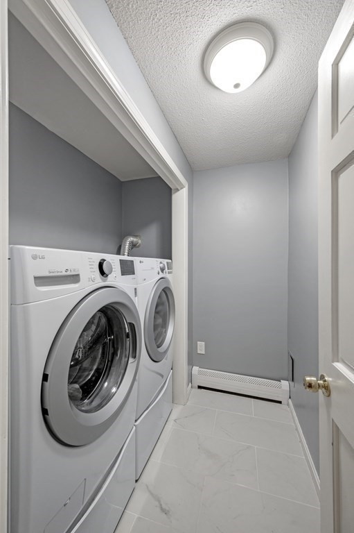21 Porter Road Boxford, MA 01921 - Photo 27 of 42 a utility room with dryer and washer