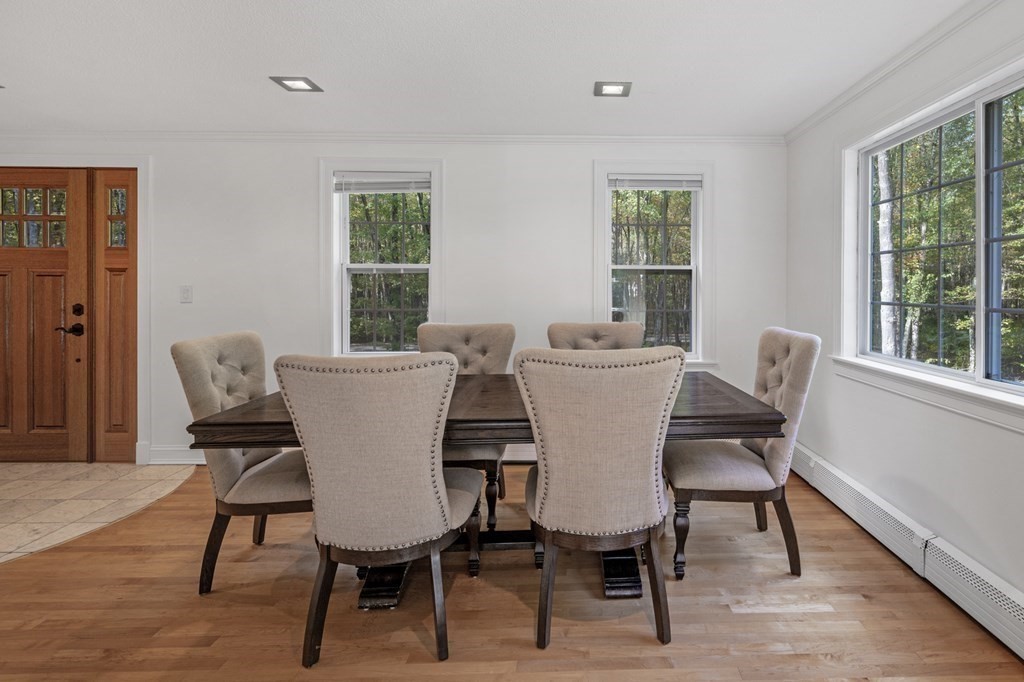 21 Porter Road Boxford, MA 01921 - Photo 4 of 42 a view of a dining room with furniture window and wooden floor