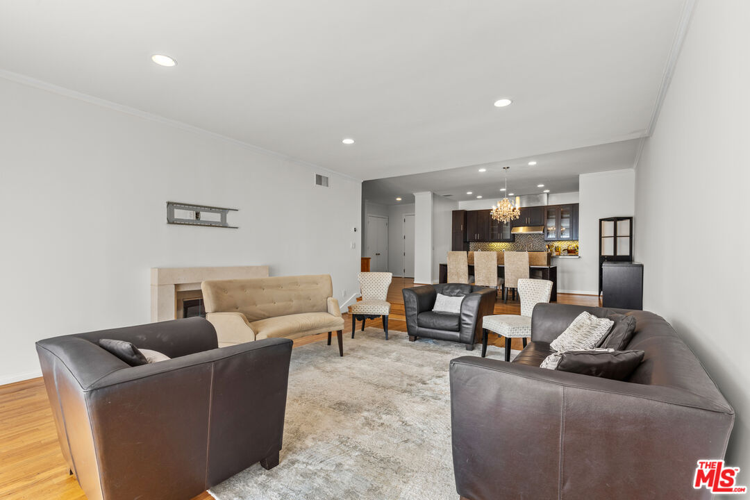 1260 South Beverly Glen Boulevard, Unit 305 Los Angeles, CA 90024 - Photo 15 of 28 a living room with furniture