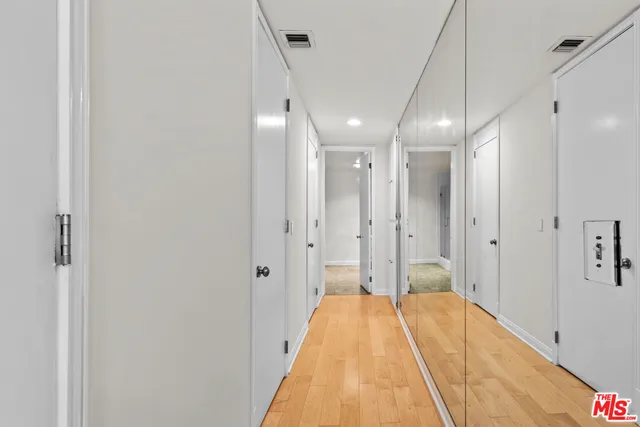 a spacious bathroom with a bathtub and shower