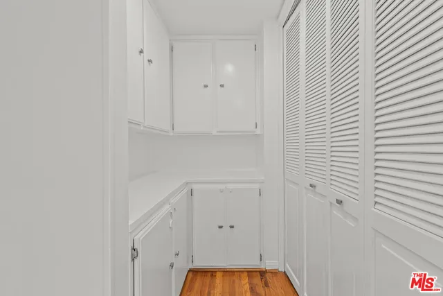 a view of a kitchen storage and utility room