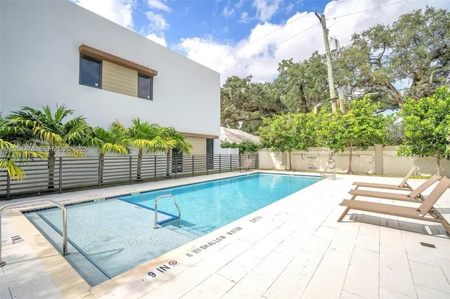 a view of a backyard with a patio