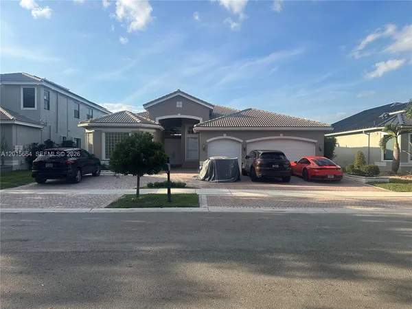 a front view of a house with street