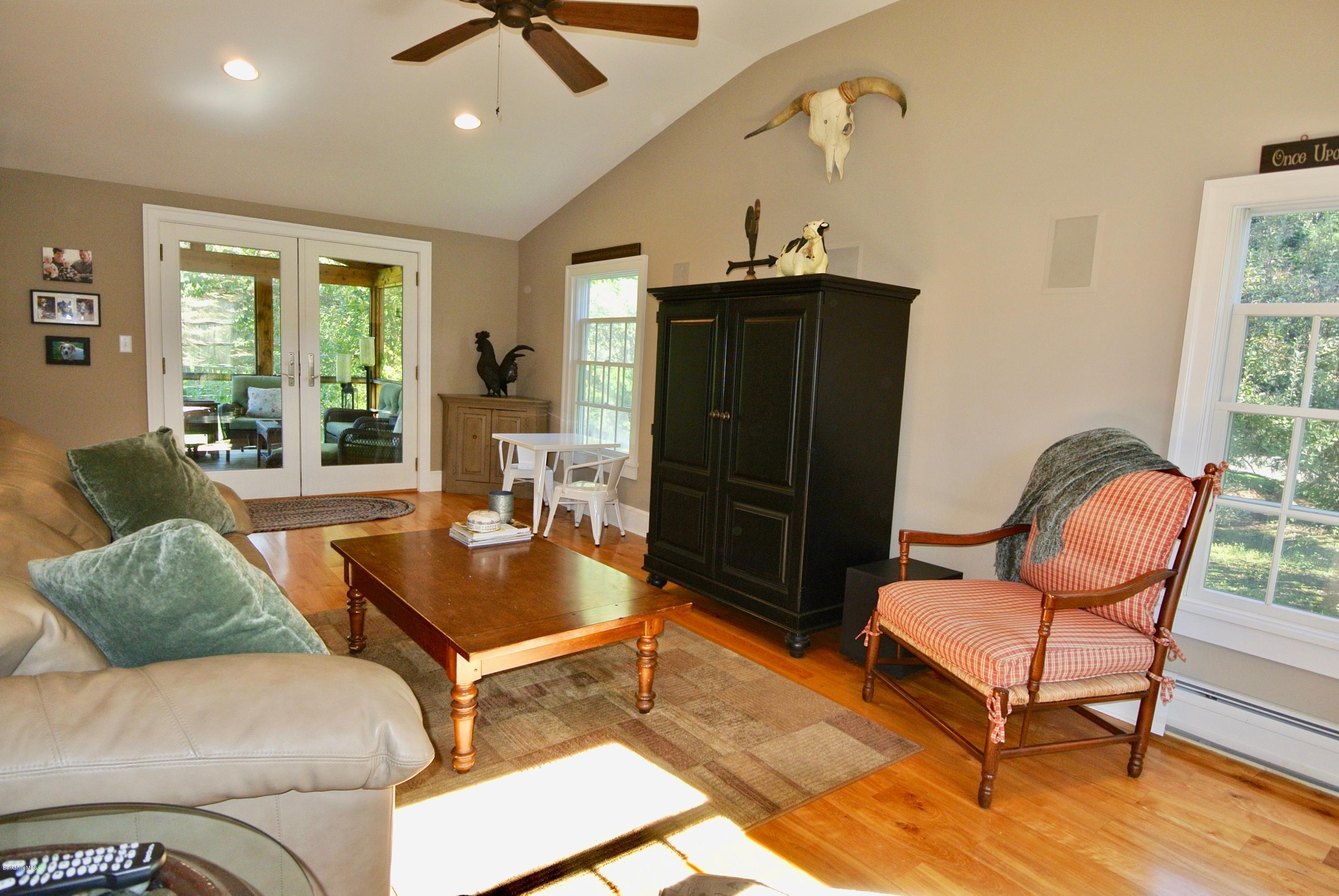 3136 State Road Richmond, MA 01254 - Photo 12 of 29 a living room with furniture and a window