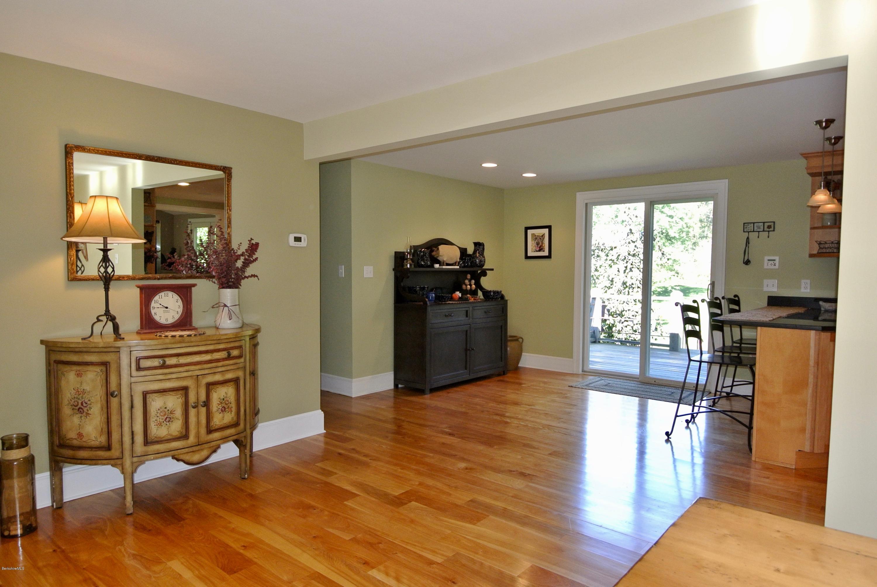 3136 State Road Richmond, MA 01254 - Photo 16 of 29 a living room with furniture and a flat screen tv