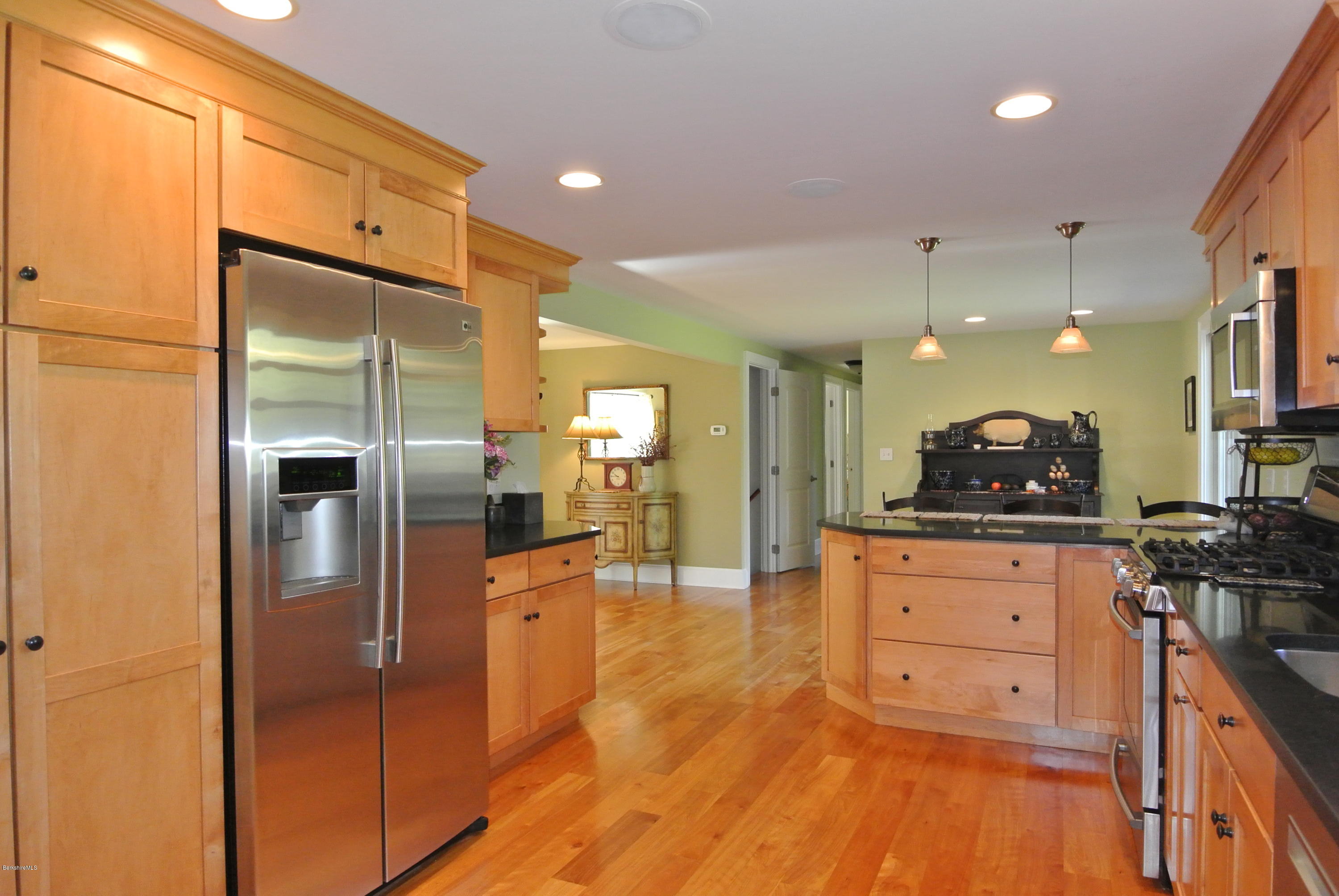 3136 State Road Richmond, MA 01254 - Photo 20 of 29 a kitchen with stainless steel appliances granite countertop a refrigerator a stove and a sink