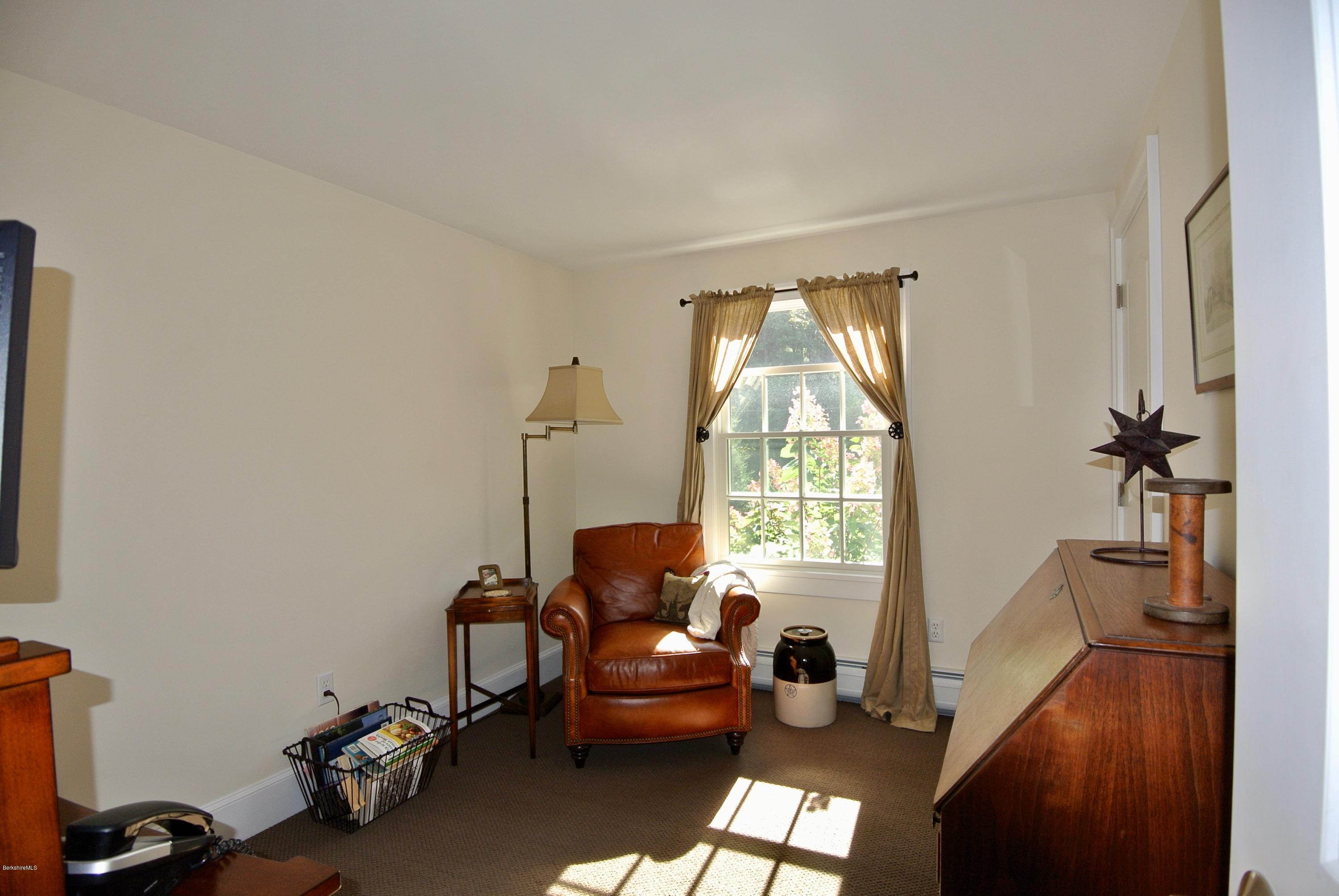 3136 State Road Richmond, MA 01254 - Photo 22 of 29 a living room with furniture and a window