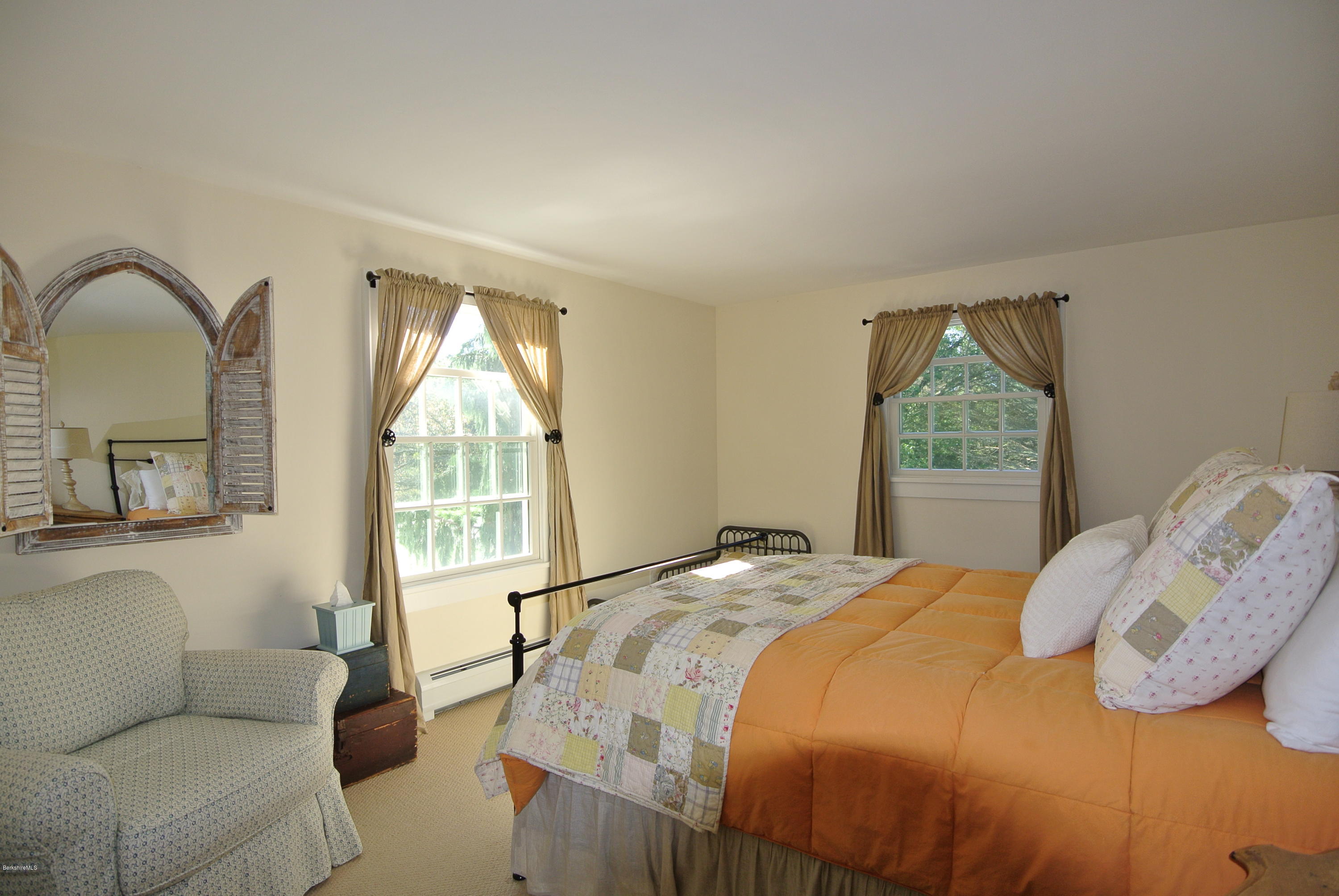 3136 State Road Richmond, MA 01254 - Photo 23 of 29 a bedroom with a bed and a large window