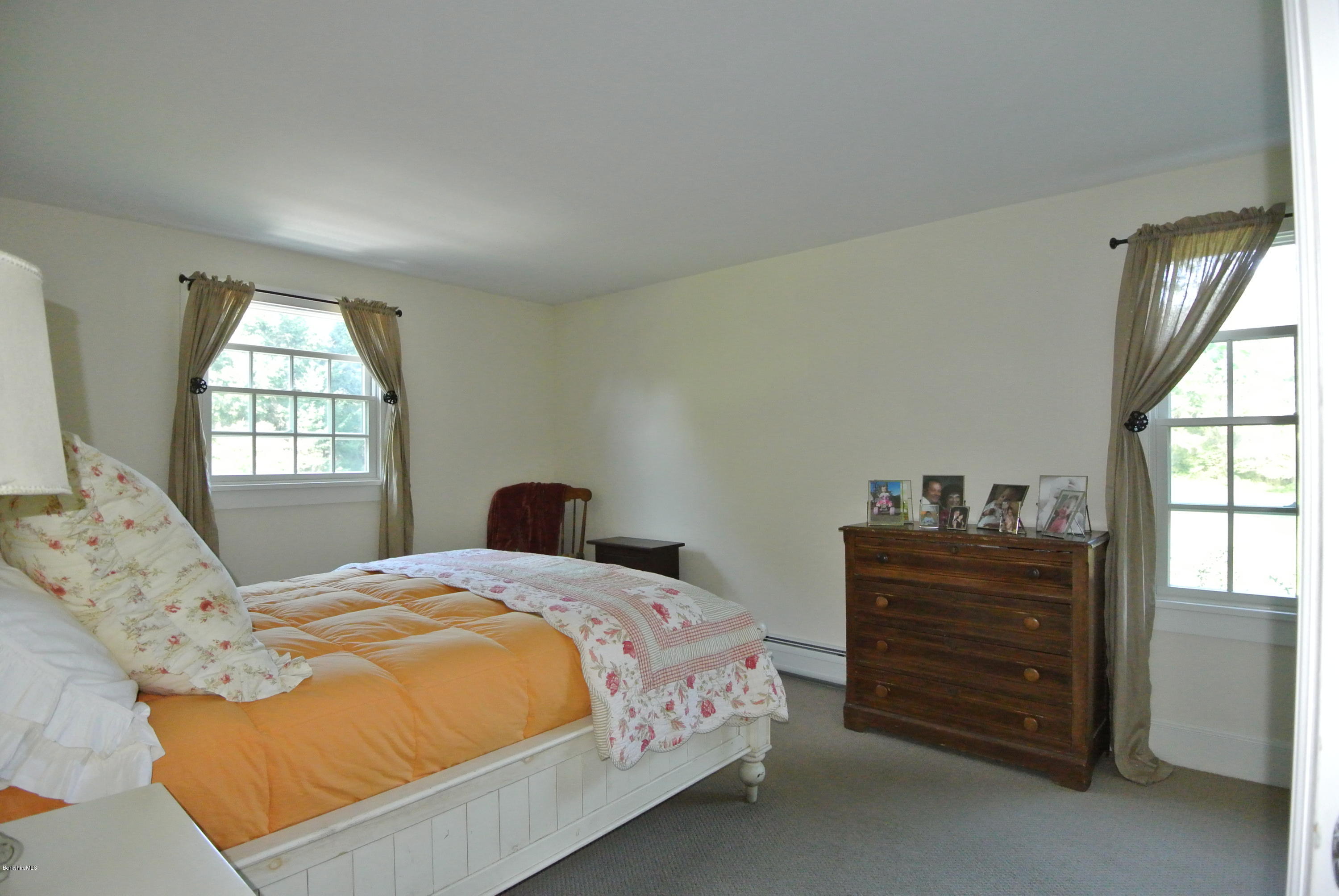 3136 State Road Richmond, MA 01254 - Photo 24 of 29 a bedroom with a bed and a window