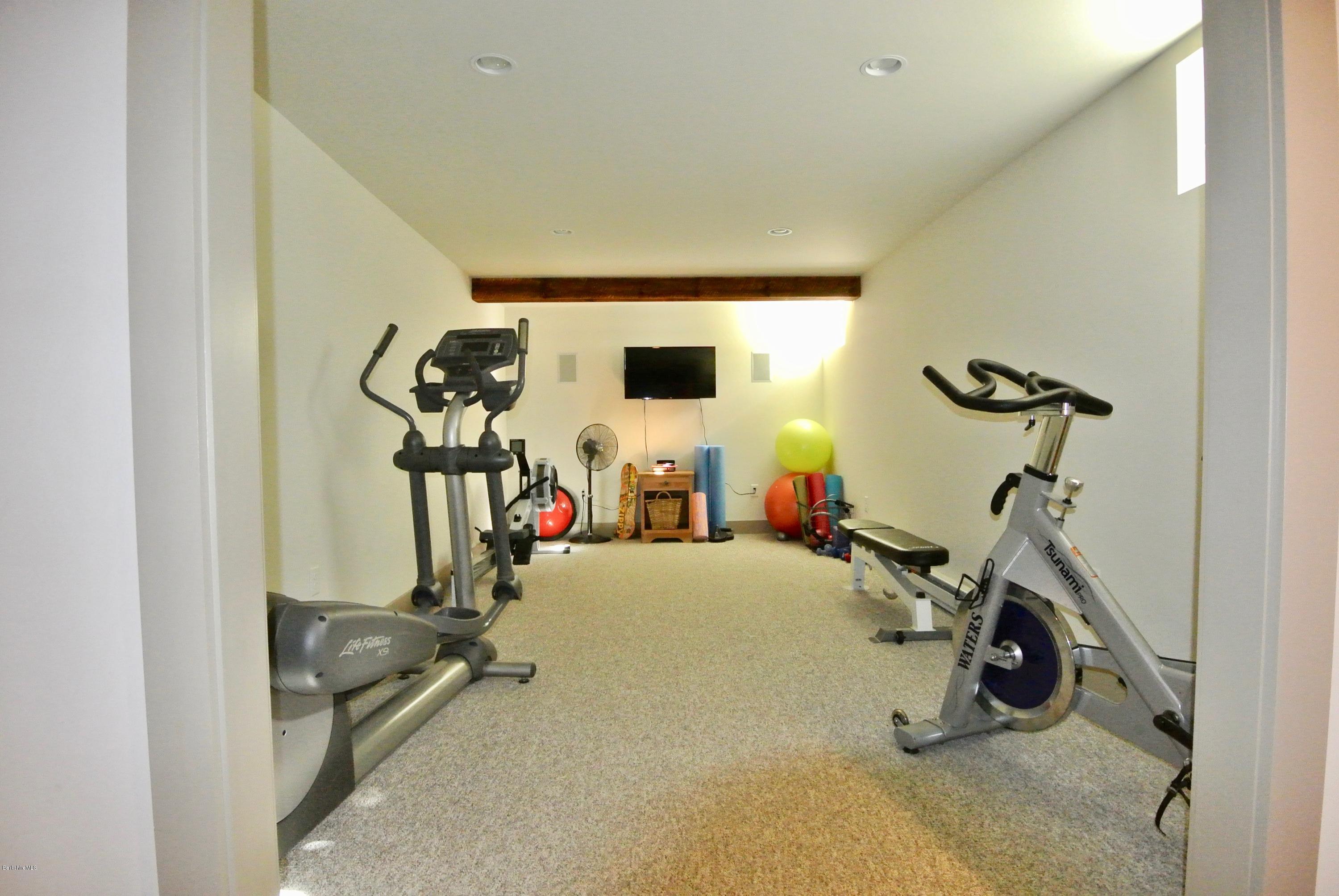 3136 State Road Richmond, MA 01254 - Photo 28 of 29 a view of a room with gym equipment