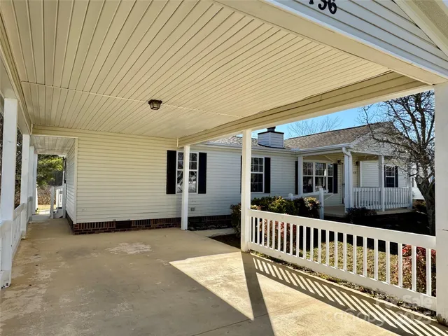 a view of a house with deck and deck