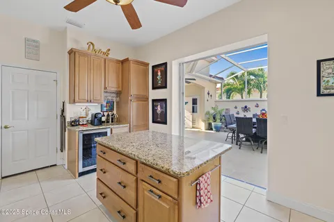 a spacious bathroom with a sink and a mirror