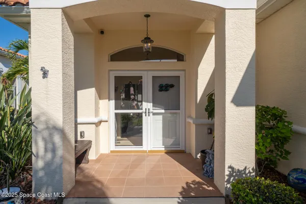 a view of a dining room with furniture and window