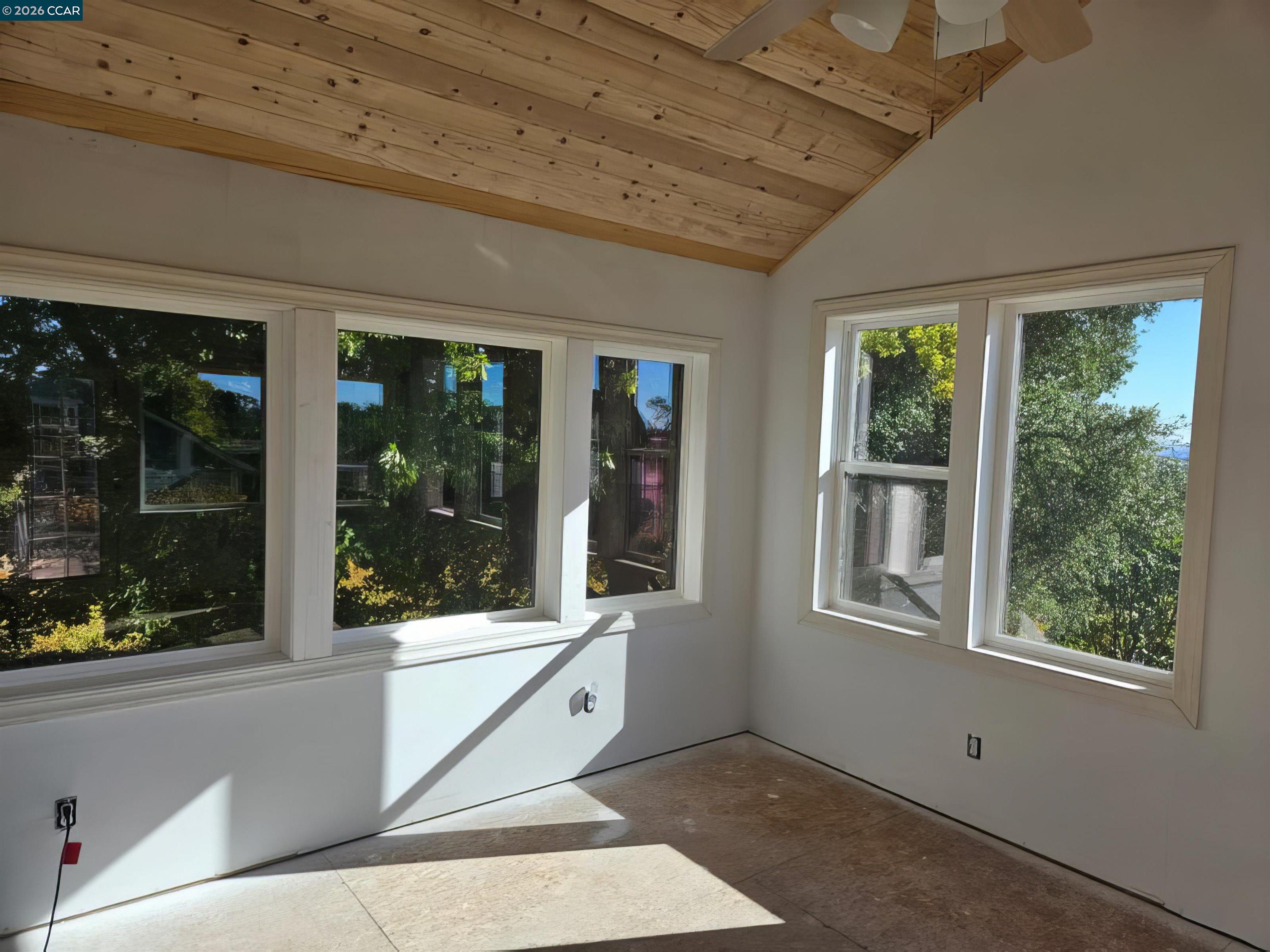 10580 Dickson Road Plymouth, CA 95669 - Photo 18 of 64 a living room with large windows
