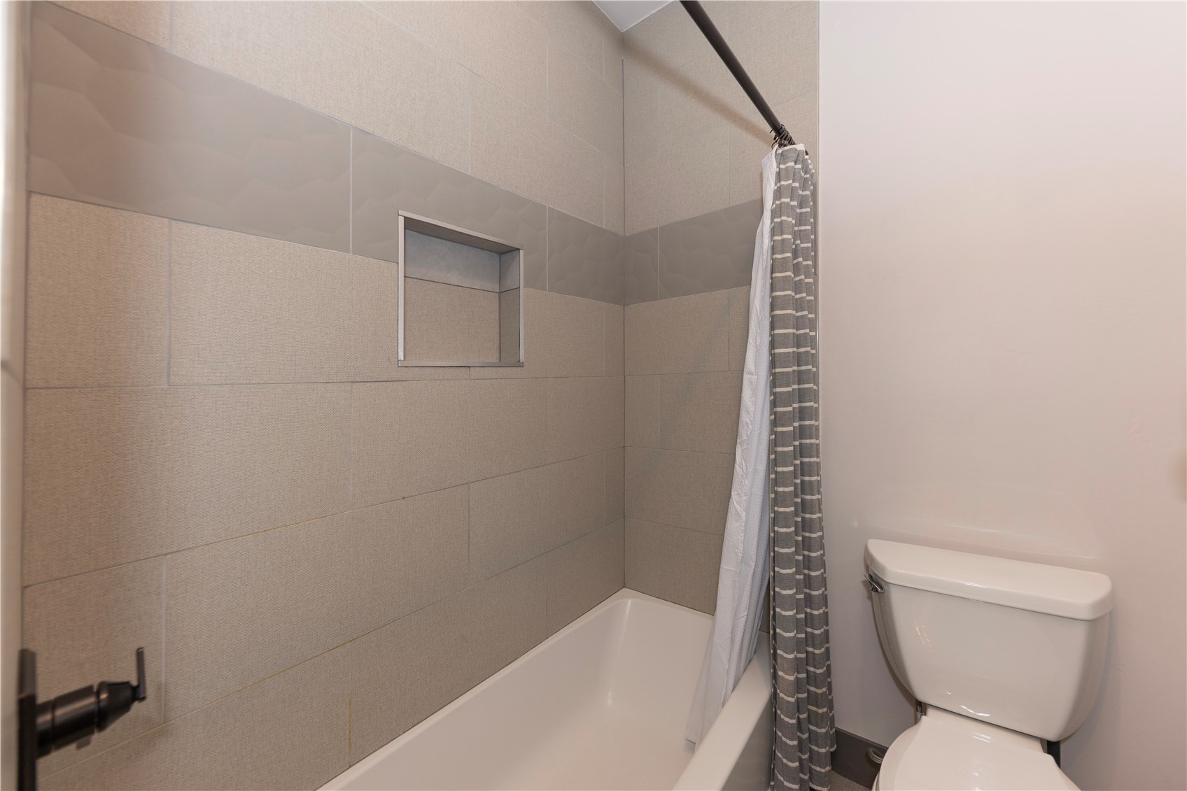 260 Fuller Placer Road Breckenridge, CO 80424 - Photo 27 of 32 a white toilet sitting next to a bath tub