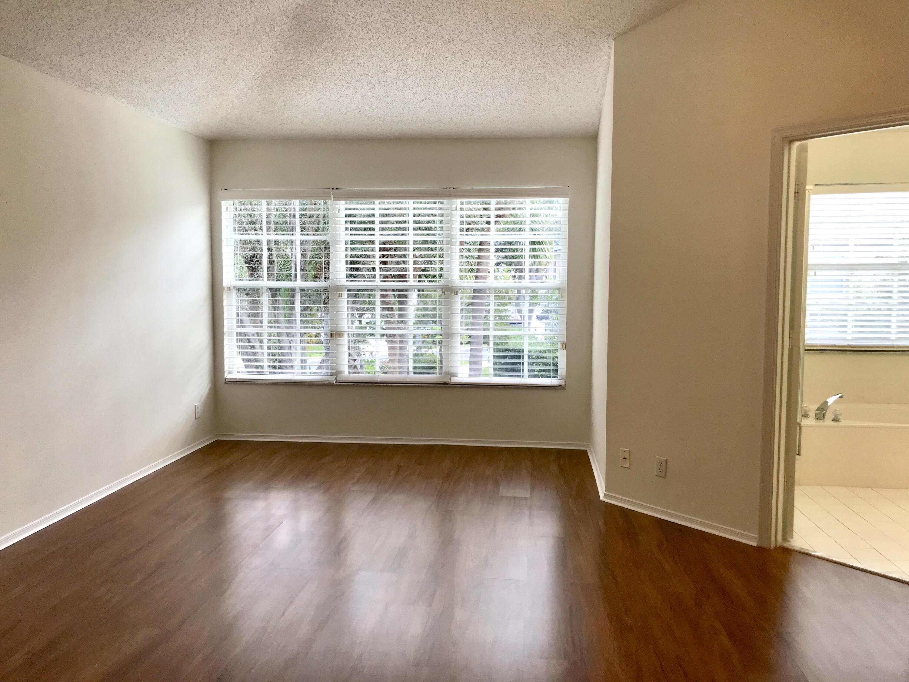 21551 St Andrews Grand Circle, Unit 39 Boca Raton, FL 33486 - Photo 10 of 19 Primary Bedroom