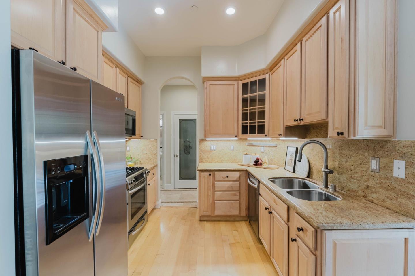 2748 Montavo Place Campbell, CA 95008 - Photo 5 of 31 a kitchen with stainless steel appliances granite countertop a sink stove and refrigerator