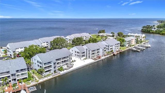 a hallway with a furniture and a large window